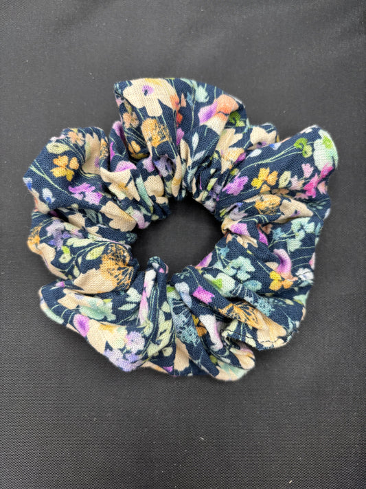 Floral patterned scrunchie on a black background